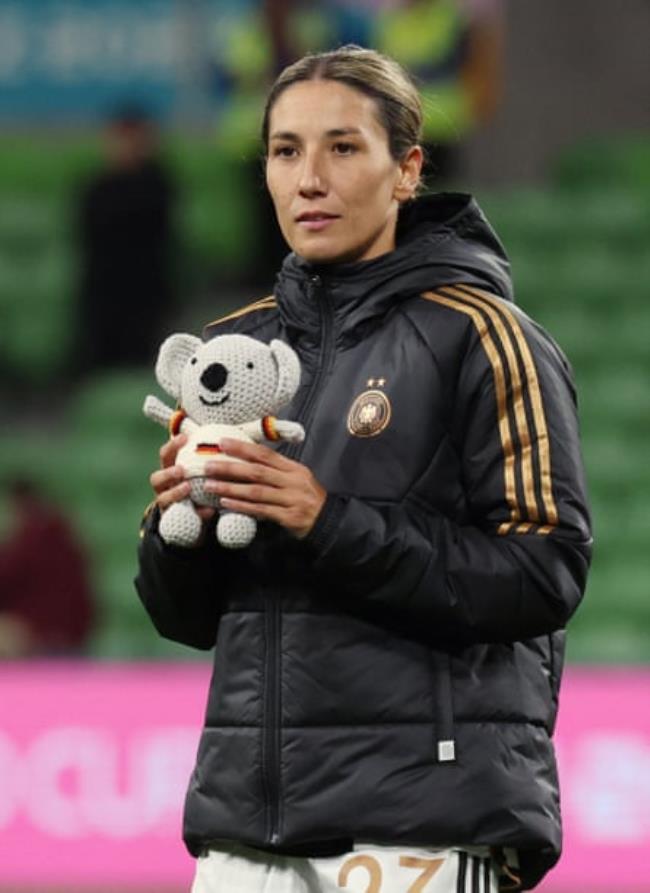 Germany’s Sara Doorsoun with the toy koala Waru.